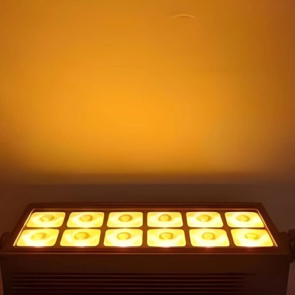 12x20W RGBWA UV LED wall washer light illuminating an outdoor event space.