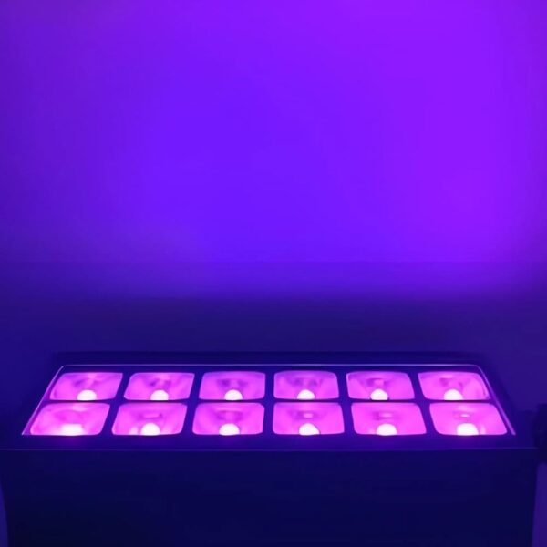 12x20W RGBWA UV LED wall washer light illuminating an outdoor event space.